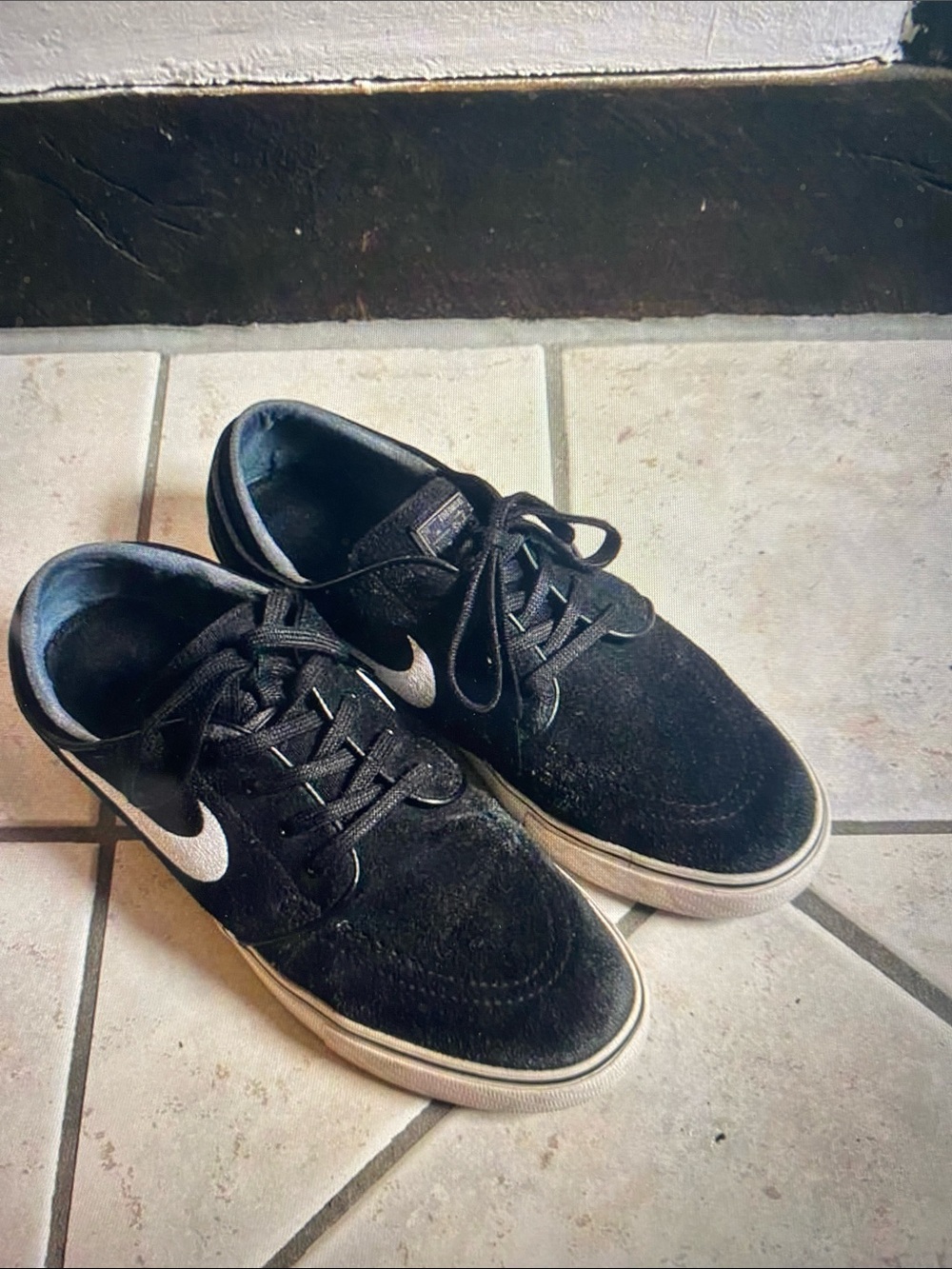 Nike Black Suede Sneakers with White Swoosh